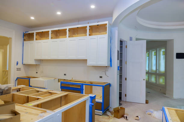 In a newly constructed house, the installation of white cabinets in the kitchen was completed as part of a bathroom remodeling service and complete home remodeling in Tiburon, CA by Tycon Builders Inc.