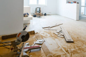 Cluttered room with various construction materials and tools, showcasing an active building environment for complete home remodeling in Burlingame.