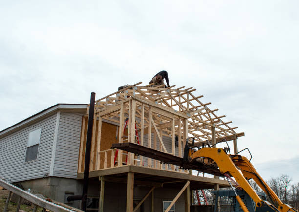 A partially built house with scaffolding and construction materials visible, showcasing the ongoing construction process by Tycon Builders in Tiburon.